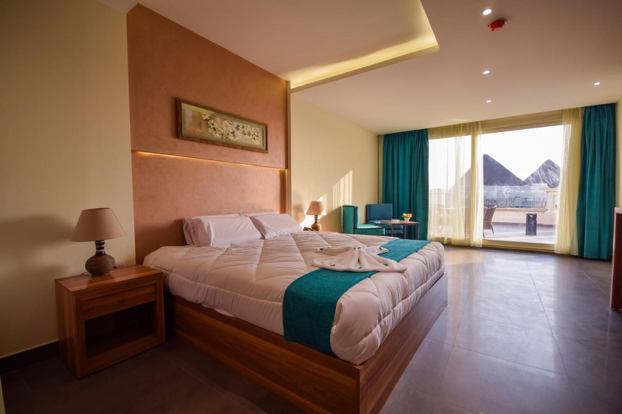 New Pyramid Quen Hotel カイロ エクステリア 写真